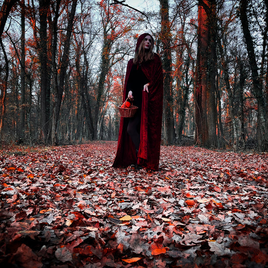 Girl in Red Cloak with picnic basket headed to grandmas